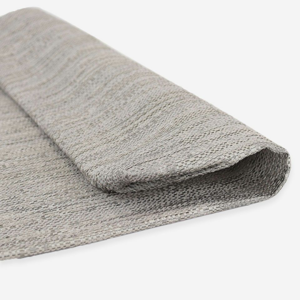 ヴェルゴラートは、自然が生み出した地層や大理石のような表情をデザインしたファブリックです