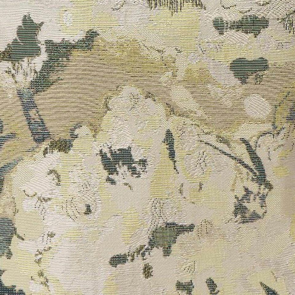 ミモザの花の粒々とふわっとやわらかいふくらみを、緻密で繊細な数種の風通織（二重織）の連なりと、込み入った織組織で表現しました