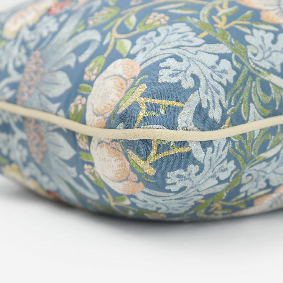 ベージュ色のパイピングをつけています／カラー：ブルーグリーン