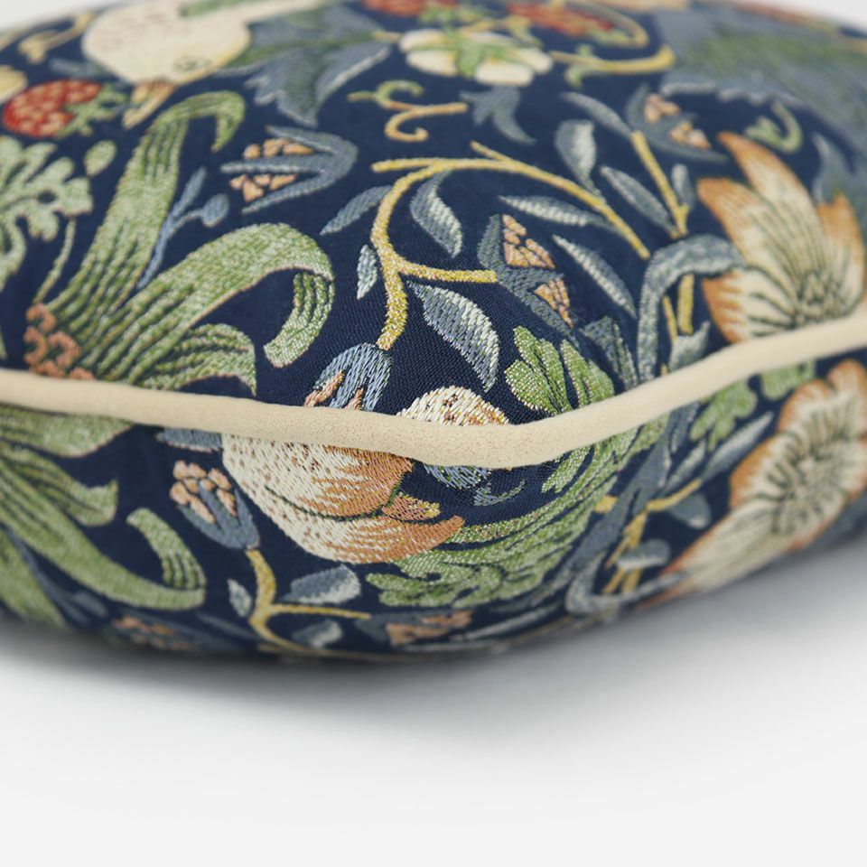 ベージュ色のパイピングをつけています／カラー：ブルー