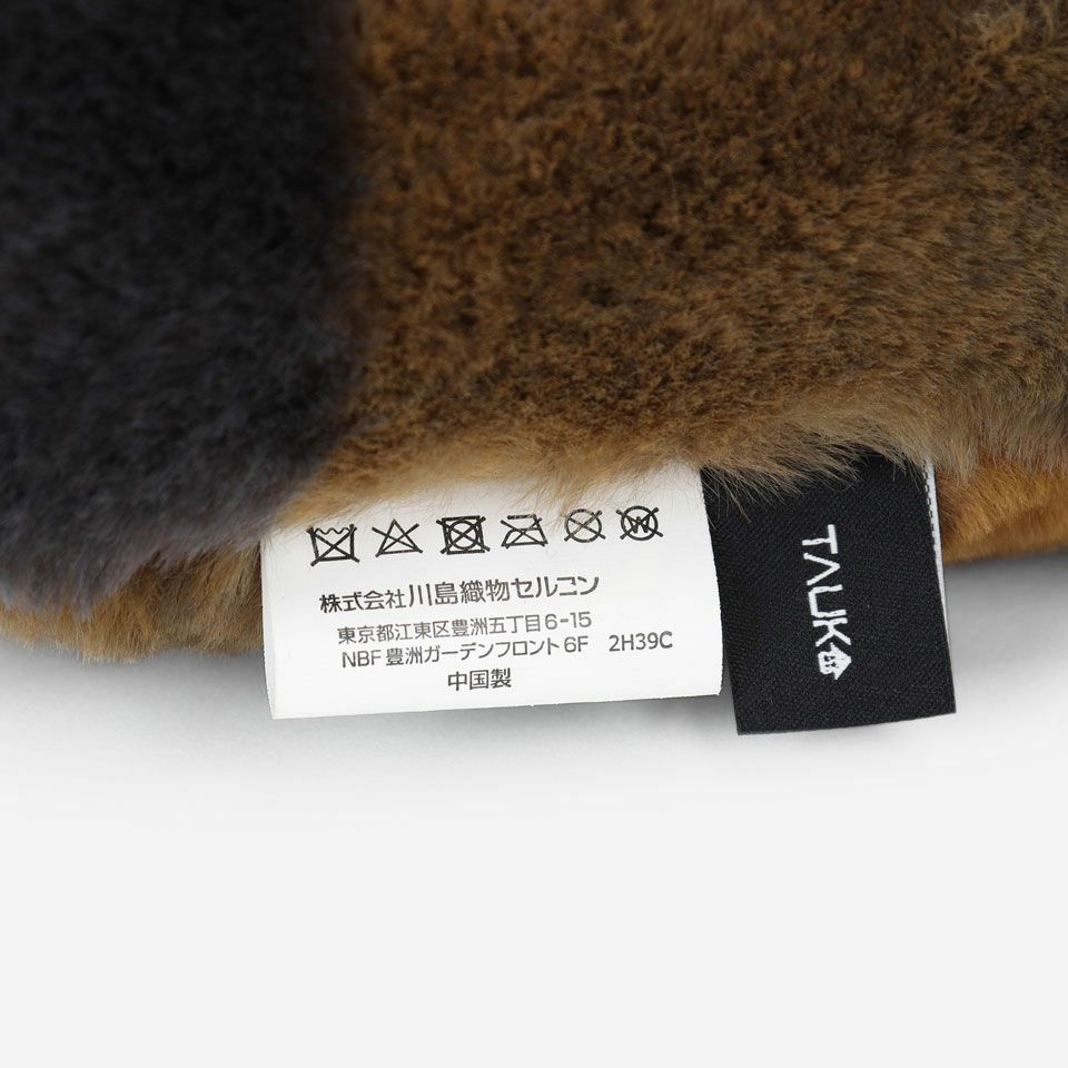 「TAUKO」のブランドタグが付いています